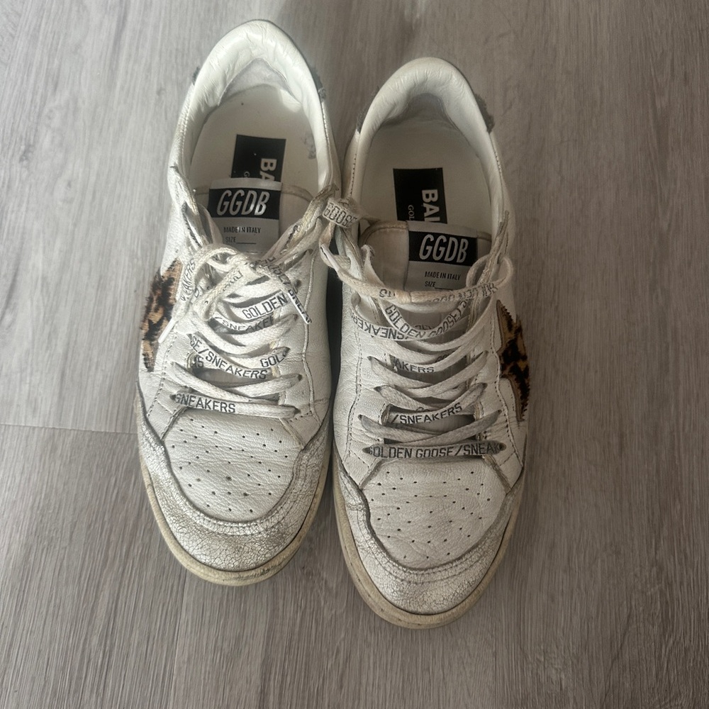 Golden Goose Distressed White Sneakers with Black and Brown Accents